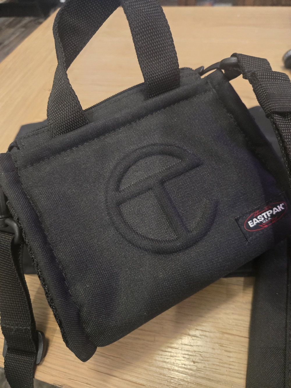 Eastpak Black Compact Crossbody Belt Bag with Embossed Logo